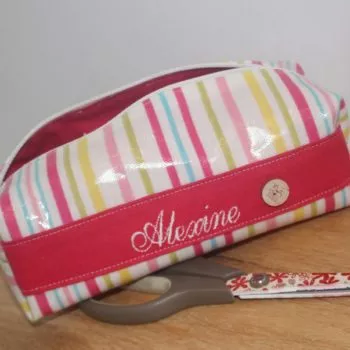 Trousse rayée enduite