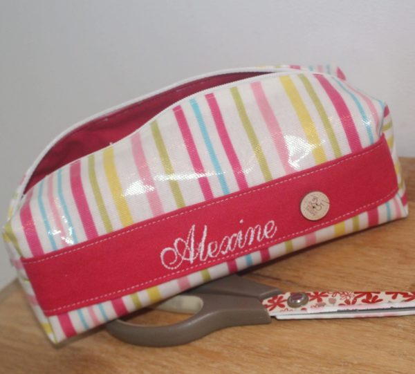 Trousse rayée enduite
